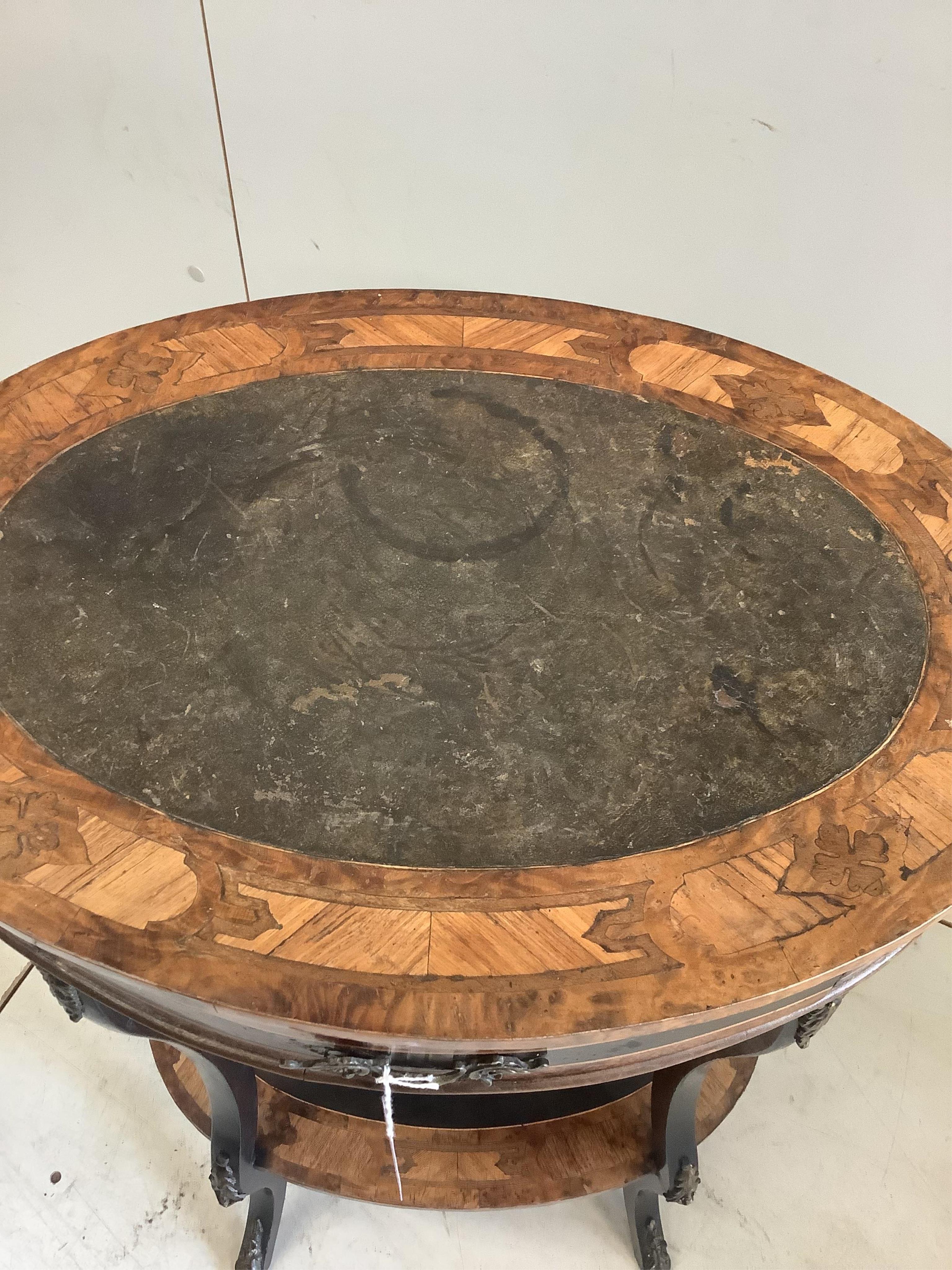 A Louis XV-style two tier occasional table, width 52cm, depth 38cm, height 73cm